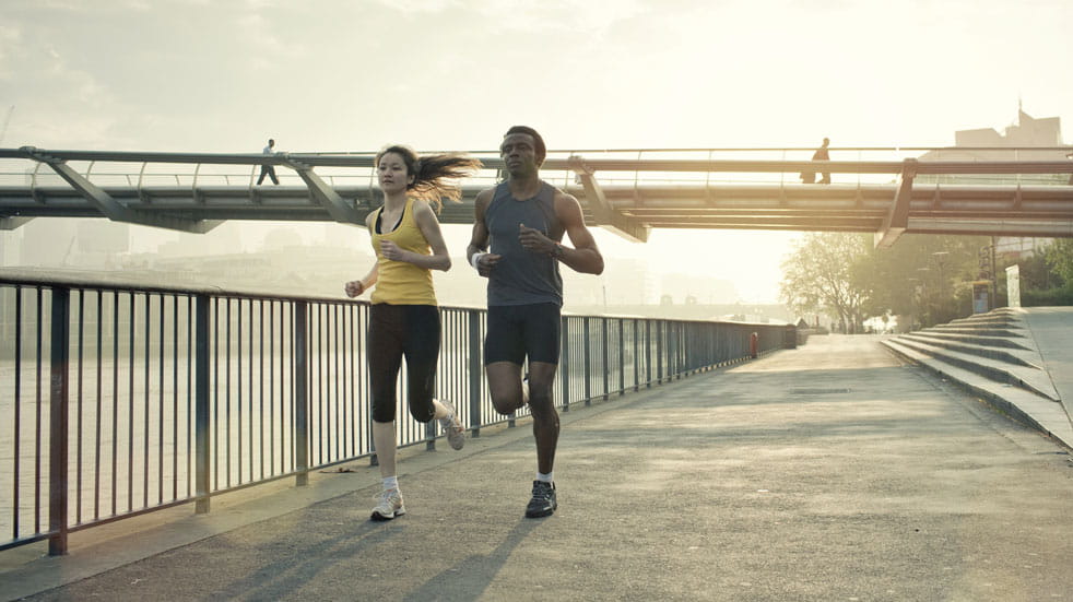 How to start running; man and woman running in London